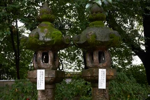 Two moss covered lanterns at the famous Fushimi Inari Shrine Stock Photos