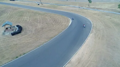 Two motorcycles racing Stock Footage 126305565