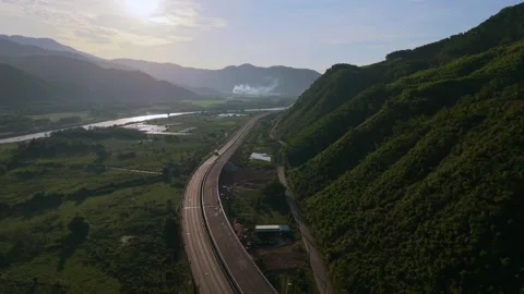 Two Mountain Roads Following A River Through Green Valley Vietnam Video stock 337807687