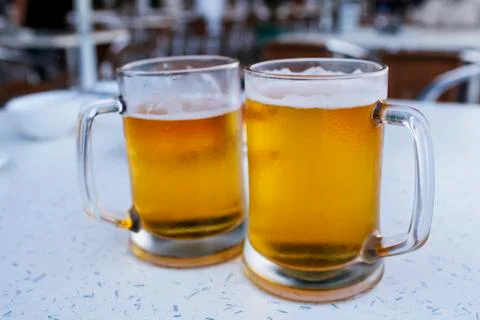 Two mugs of beer Stock Photos