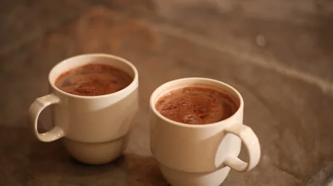 Two mugs of hot chocolate Stock-Footage 61653808