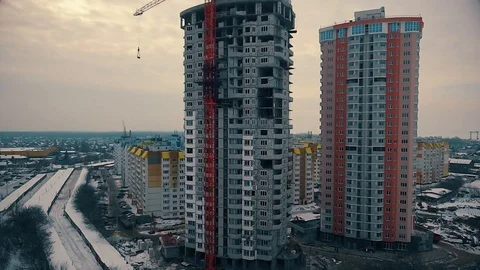 Two multi-storey houses and a crane Stock Footage 85982058
