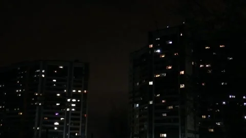 Two multi-storey residential buildings. Many luminous windows. A Video stock 153955103