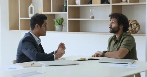 Two multiethnic businessmen shake hands after concluding deal, finish 스톡 동영상 243659254