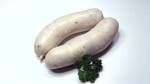 Two Munich white sausages on white background, rotating Stock Footage 235535306