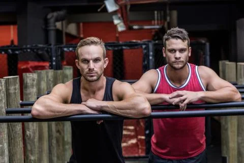Two muscular men looking at camera 스톡 사진