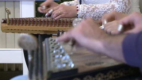 Two music students playing Qanun Stock Footage 86863738