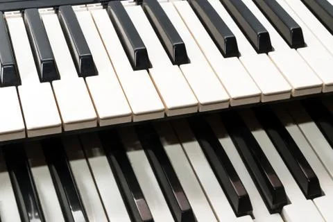 Two musical keyboards Stock Photos