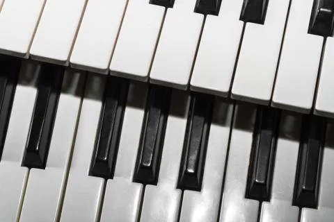 Two musical keyboards Stock Photos