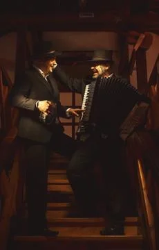 Two Musicians on Staircase 스톡 사진