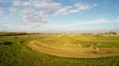 Two mx bikes racing while followed and filmed from air Stock Footage 52441990
