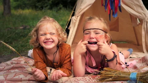 Two naughty blonde sisters make faces at the camera. Stock Footage 148238342