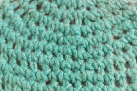 Two needle knit fabric with turquoise wool yarn in close up detail Fotos Stock