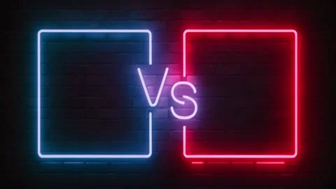 Two neon frames, blue and red, with the words Versus Vs. Brick background. Stock Footage 273953110
