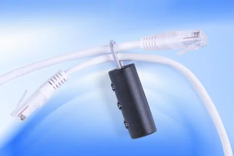 Two network cables bind with combination lock on blue Foto stock
