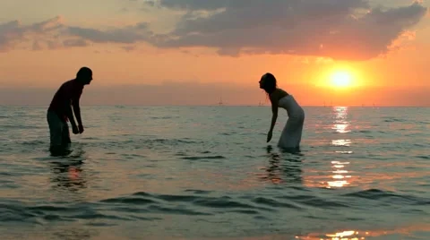 Two Newlyweds Splashed Into The Sea Stock Footage 52695493