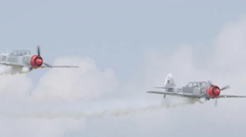Two North American T-6 Texan warbirds performing at EAA AirVenture Oshkosh Video stock 50188892
