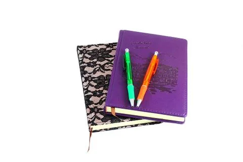Two notebook and two pens Stock Photos