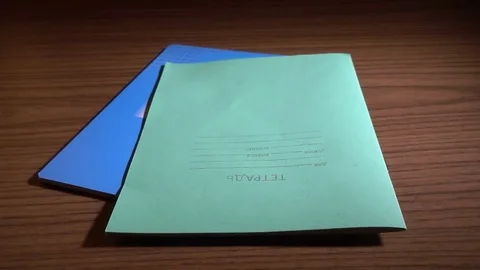 Two Notebooks Falling On Table 스톡 동영상 83700039