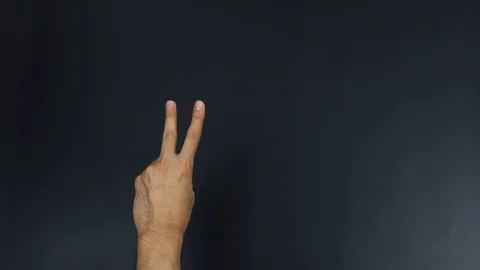 Two number hand gesture on black background Video stock 90300071