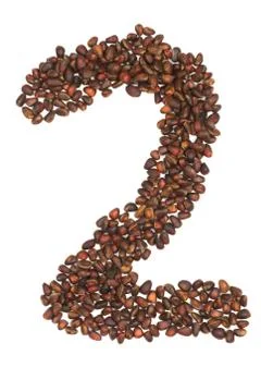 Two number made of cedar  nuts Stock Photos