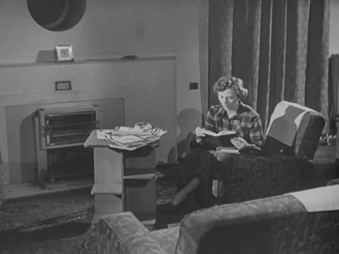 Two nurses talking together after work about their job in their room, UK 1951 Stock Footage 134029762