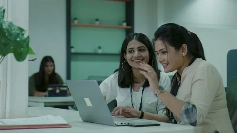 Two office Asian workers talking in office,young Indian colleagues. Stock Footage 168218673
