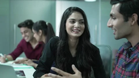 Two office Asian workers talking in office,young Indian colleagues discussing 動画素材 170126833