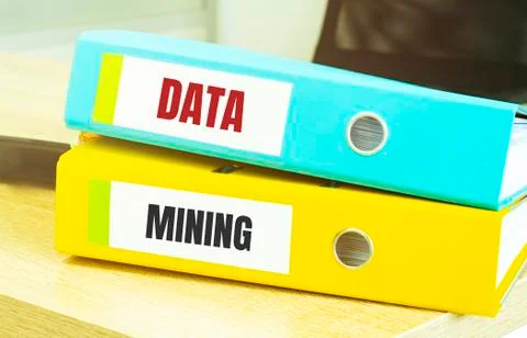Two office folders with text DATA MINIG Stock Photos