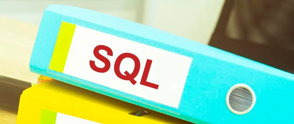 Two office folders with text SQL. Business concept Stock Photos