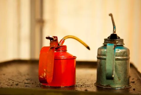 Two oil cans Stock Photos