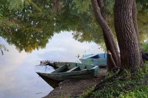 Two old boat on the river Stock Photos