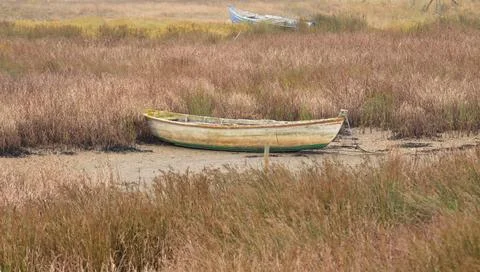 Two old boats stranded on a dry lake Stock Photos