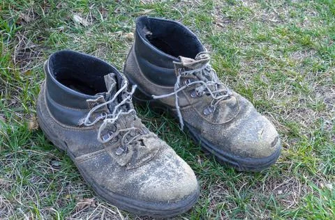 Two Old boot over grass Stock Photos