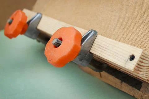 Two old  clamp with red handle Stock Photos