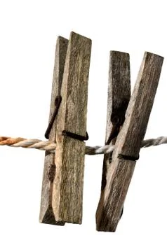 Two old clothes pegs Stock Photos