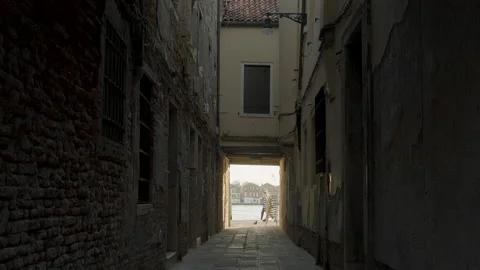 Two old linked buildings in narrow alley in Venice, Italy Stock-Footage 151349298
