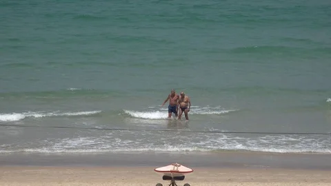 Two old men coming form the see Stock Footage 111056039