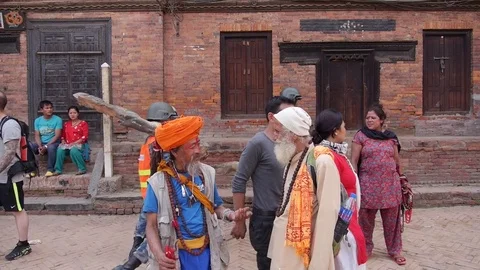 Two old men in national clothes on Kathmandu street. Stock Footage 82351310