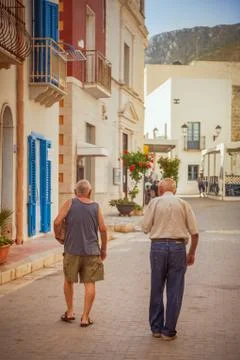 Two Old Men Walking, Marettimo, Italy Stock Photos