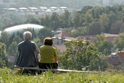 Two old people on bench Foto stock