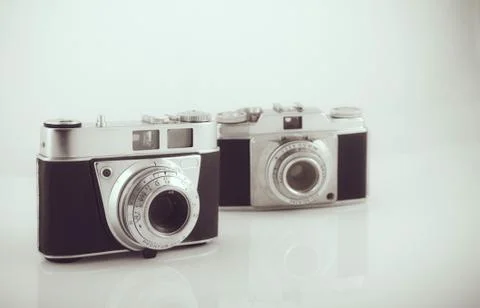 Two old retro cameras Stock Photos