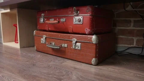 Two old retro suitcases lie on the floor Stock Footage 153803851