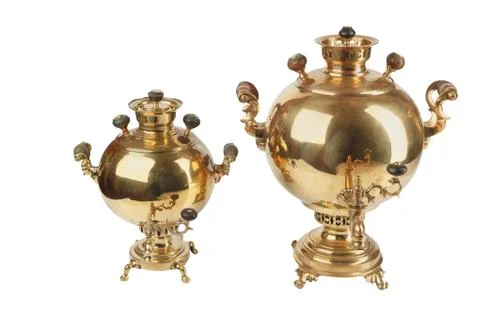 Two  Old round russian tea samovars isolated on white Stock Photos