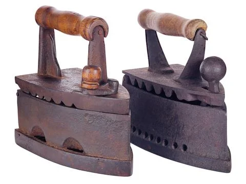 Two old rusty coal irons isolated on white Stock Photos
