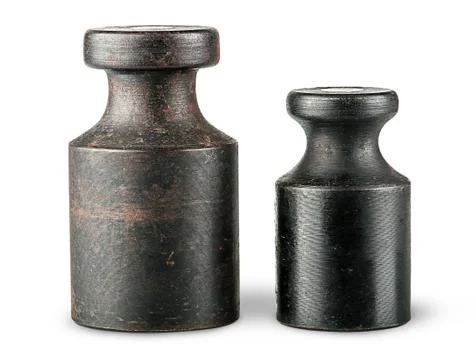 Two old rusty scale weights Stock Photos