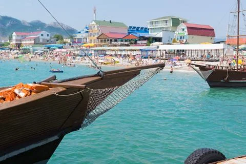 Two old ship on the background of sandy beach Foto stock