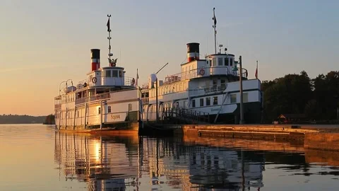 Two old steam cruise liners stay on harbor. Ships still travels on the lake Stock Footage 267514520