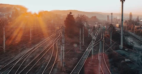 Two old trains passing by in the beautiful sunset Stock Footage 178023740