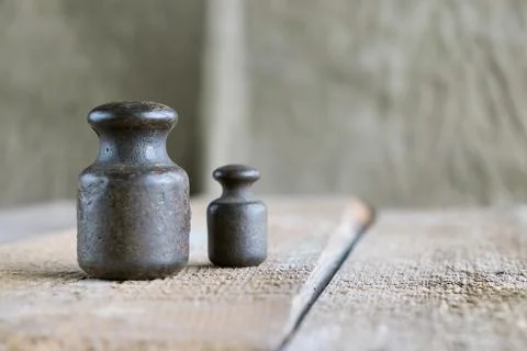 Two old weights Stock Photos